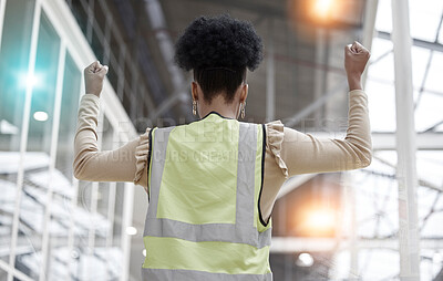 Buy stock photo Woman, success or architect in celebration of deal for industrial property or real estate with hands up. Back view, winner or happy designer with goals, target or achievement for engineering growth