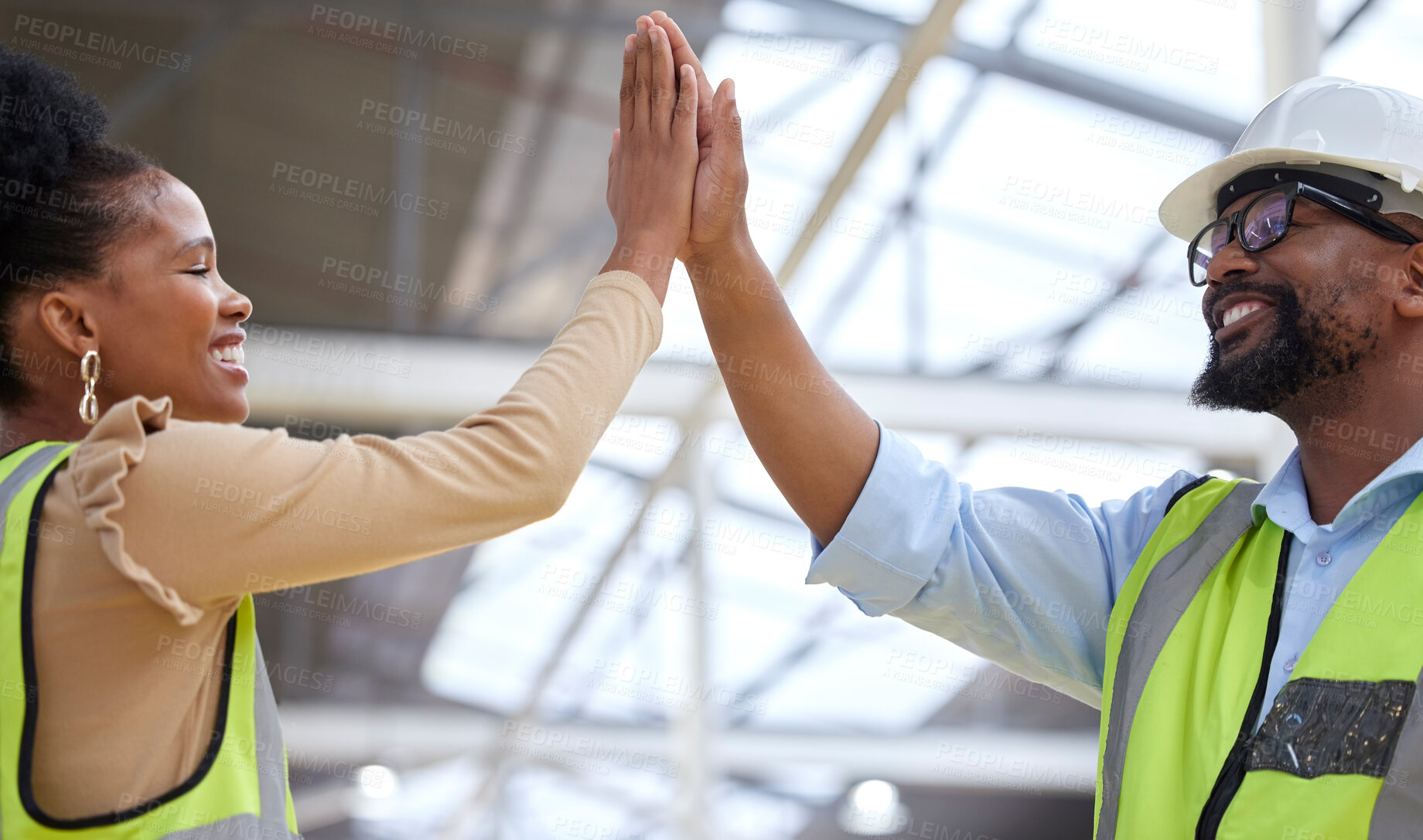 Buy stock photo Engineer, black man and woman with high five, teamwork and partnership with success, project and collaboration. Coworkers, staff and hand gesture with growth, manufacturing and support with happiness