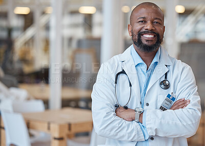 Buy stock photo Portrait, black man and happy doctor with arms crossed in hospital for healthcare. African medical professional, face and surgeon, person or confident employee from Nigeria with smile for wellness.