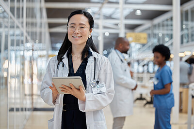 Buy stock photo Asian woman, portrait and happy doctor with tablet in hospital for healthcare, telehealth and research. Medical professional, face and surgeon, worker or employee with glasses for wellness technology
