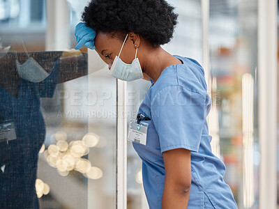Buy stock photo Surgeon, mental health pain and black woman sad after medicine fail, hospital crisis or nurse mistake. Face mask, burnout fatigue or African female doctor tired after medical risk, anxiety or service