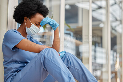 Buy stock photo Sad surgeon, crying and black woman depressed about clinic news, mental health problem or healthcare anxiety. Doctor, headache or African female nurse stress from medical risk, pain and sit on floor