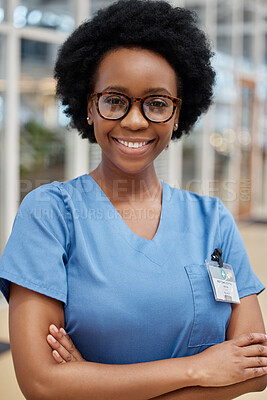 Buy stock photo Portrait, nurse and black woman with arms crossed, smile or happy in hospital. African medical professional, confidence and face of surgeon from Nigeria with glasses for healthcare service in clinic.