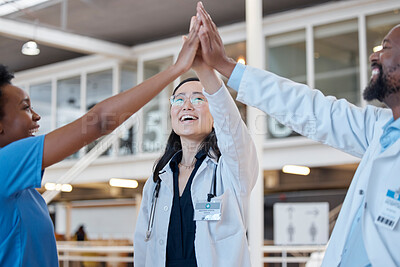 Buy stock photo High five, doctors and smile for success, team unity and celebrate medical goals in clinic. Healthcare, happy group and people join hands for celebration, motivation and collaboration of diversity