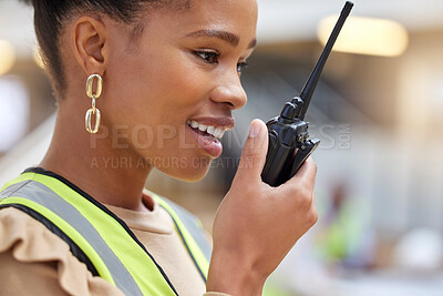 Buy stock photo Walkie talkie, black woman and engineer planning, communication and construction. African architect, radio and happy contractor with industrial project, building maintenance and logistics discussion.
