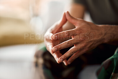 Buy stock photo Hands clasped, soldier sitting and military person with anxiety, depression or problem on sofa. Army man, couch and ptsd, stress and crisis after war, trauma and waiting in living room alone in home