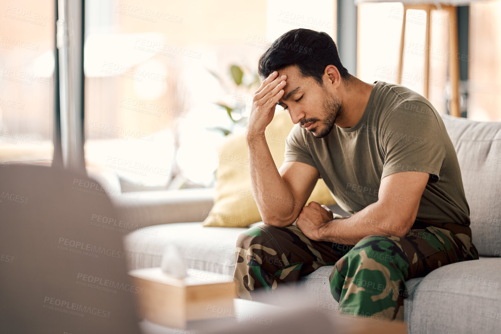 Buy stock photo Man with headache, stress and mental health problem, therapy and psychology, depressed and sitting on couch. Male person in crisis, migraine and medical issue, sad with depression and pain at home