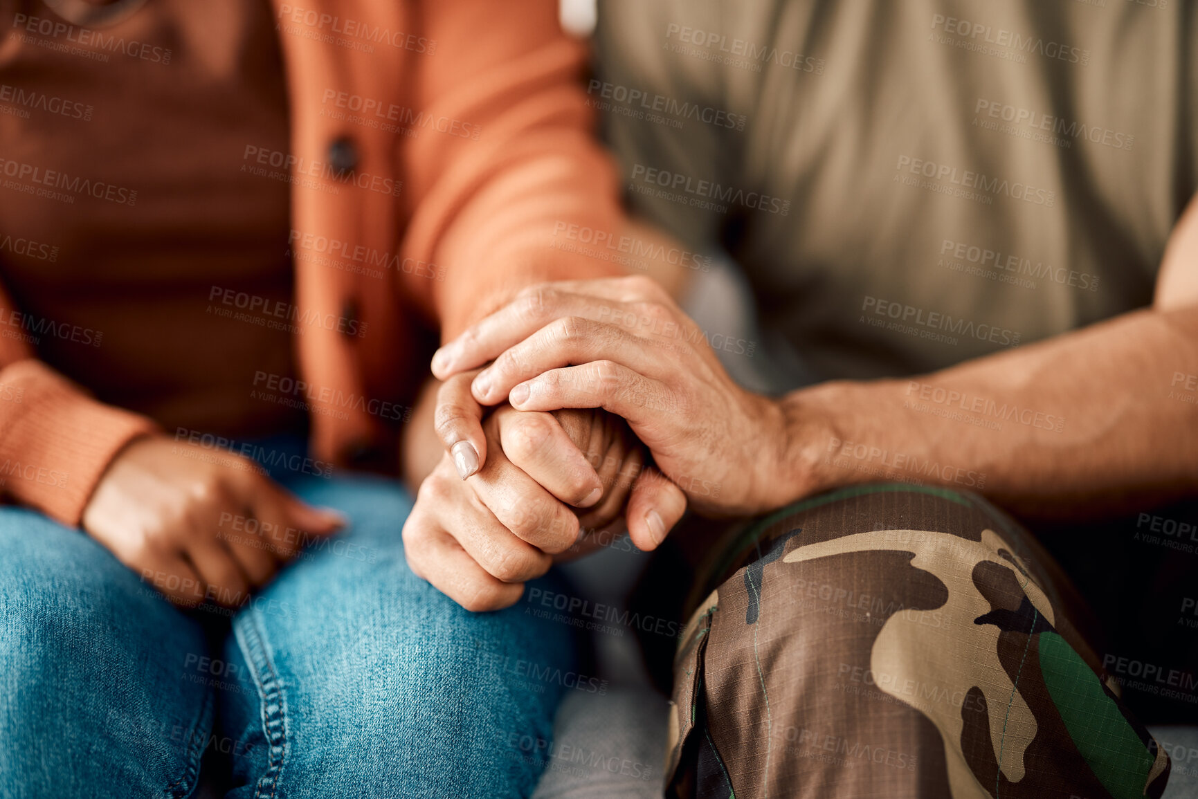 Buy stock photo Marriage, holding hands and couple on sofa in therapy for argument, problem advice and divorce counseling. Psychology, mental health and woman with military man on couch for ptsd, help and support