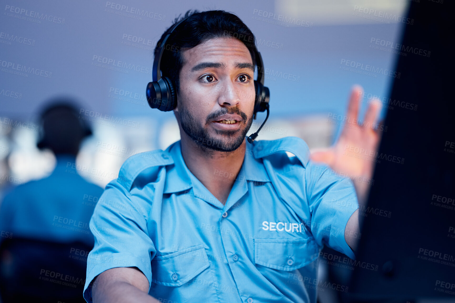 Buy stock photo Security dispatch, computer and man with problem, emergency and monitor CCTV, surveillance or crime. Safety officer, support consultation and law person reading, chat and consulting about 911 crisis