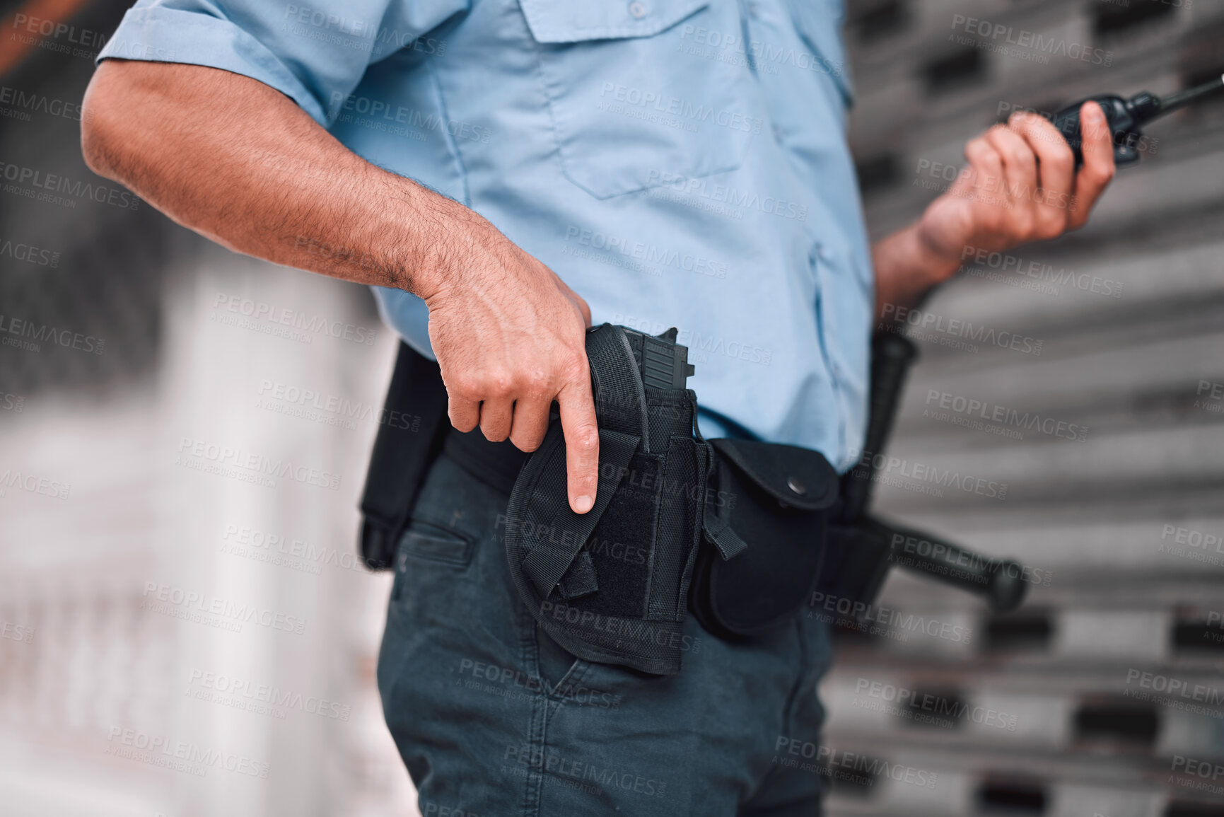 Buy stock photo Closeup, law or police officer with a gun, safety or career with legal enforcement, armed or crime. Zoom, man or security guard with service weapon, protection or danger with walkie talkie or uniform