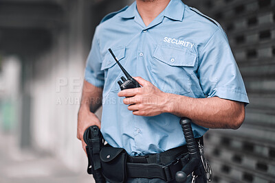 Buy stock photo Security guard, safety officer and man with walkie talkie in hand on street for protection, patrol or watch. Law enforcement, focus and duty with a crime prevention male worker in uniform in the city