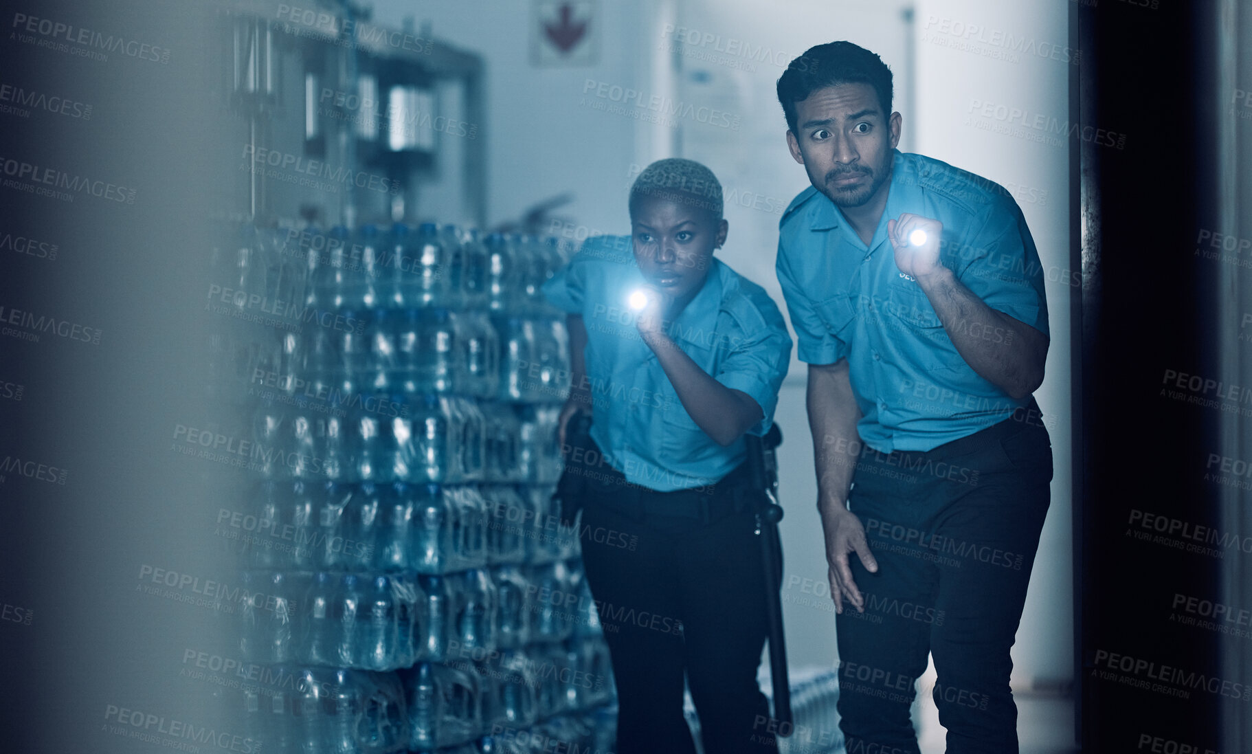 Buy stock photo Security, night or police team in crime investigation in a store for protection services in emergency or crisis. Teamwork, dark or professional safety employees search a room for criminal danger