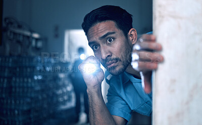 Buy stock photo Security, police and man with flashlight for investigation, inspection and property search on night shift. Surveillance, law and male person in dark room for safety, crime and protection service