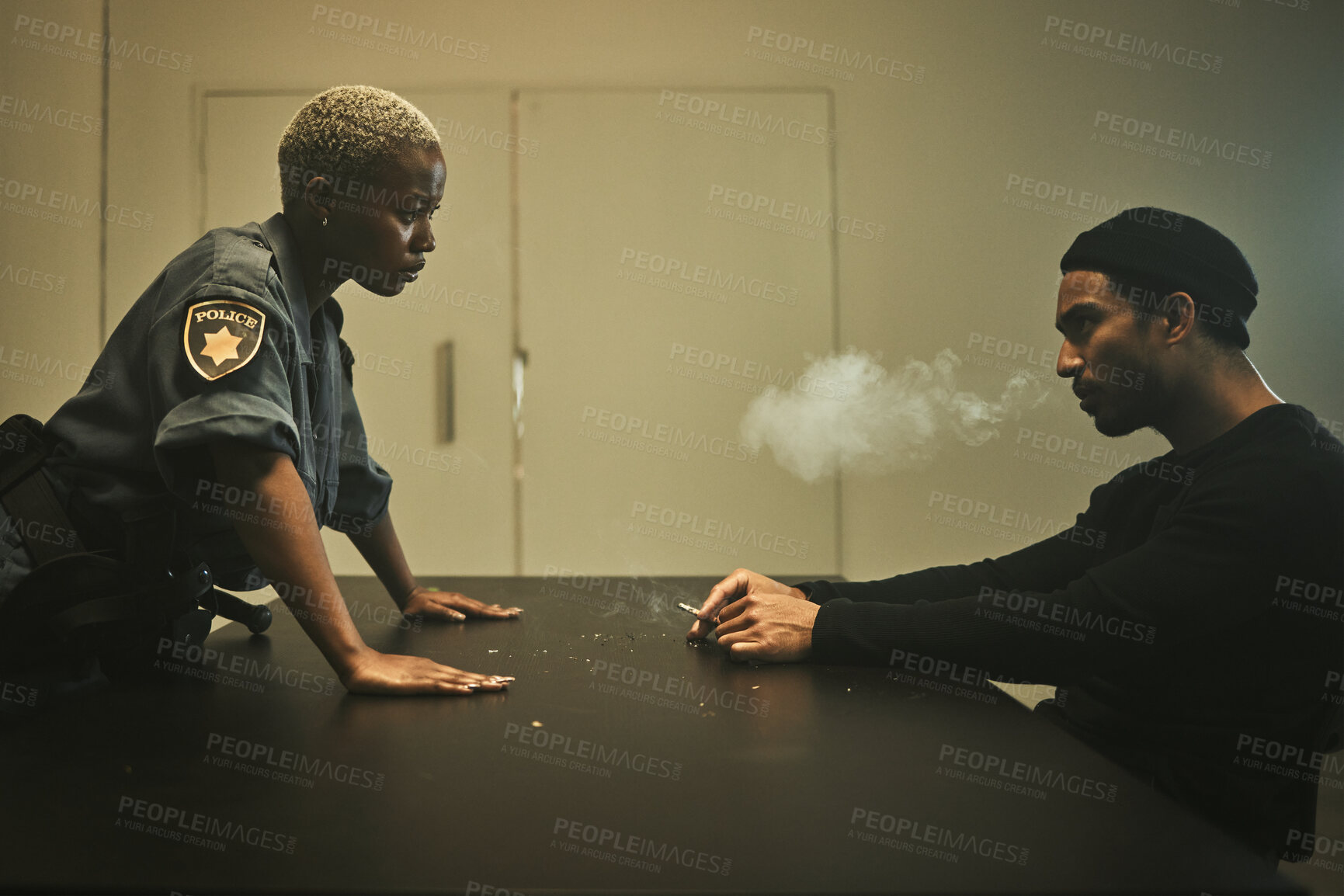 Buy stock photo Man, smoking and detective talking in interrogation room with criminal, suspect or interview with a gangster. Police officer, questioning and statement of truth on crime and person with cigarette
