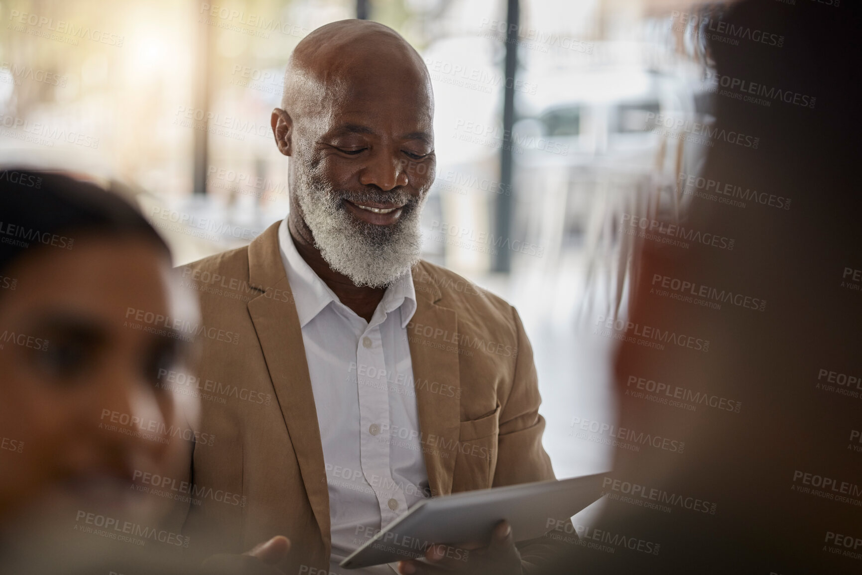 Buy stock photo Black man, tablet or boss in meeting for business growth, strategy or collaboration on project in office. Happy CEO, digital startup or African senior manager planning or working on online marketing 