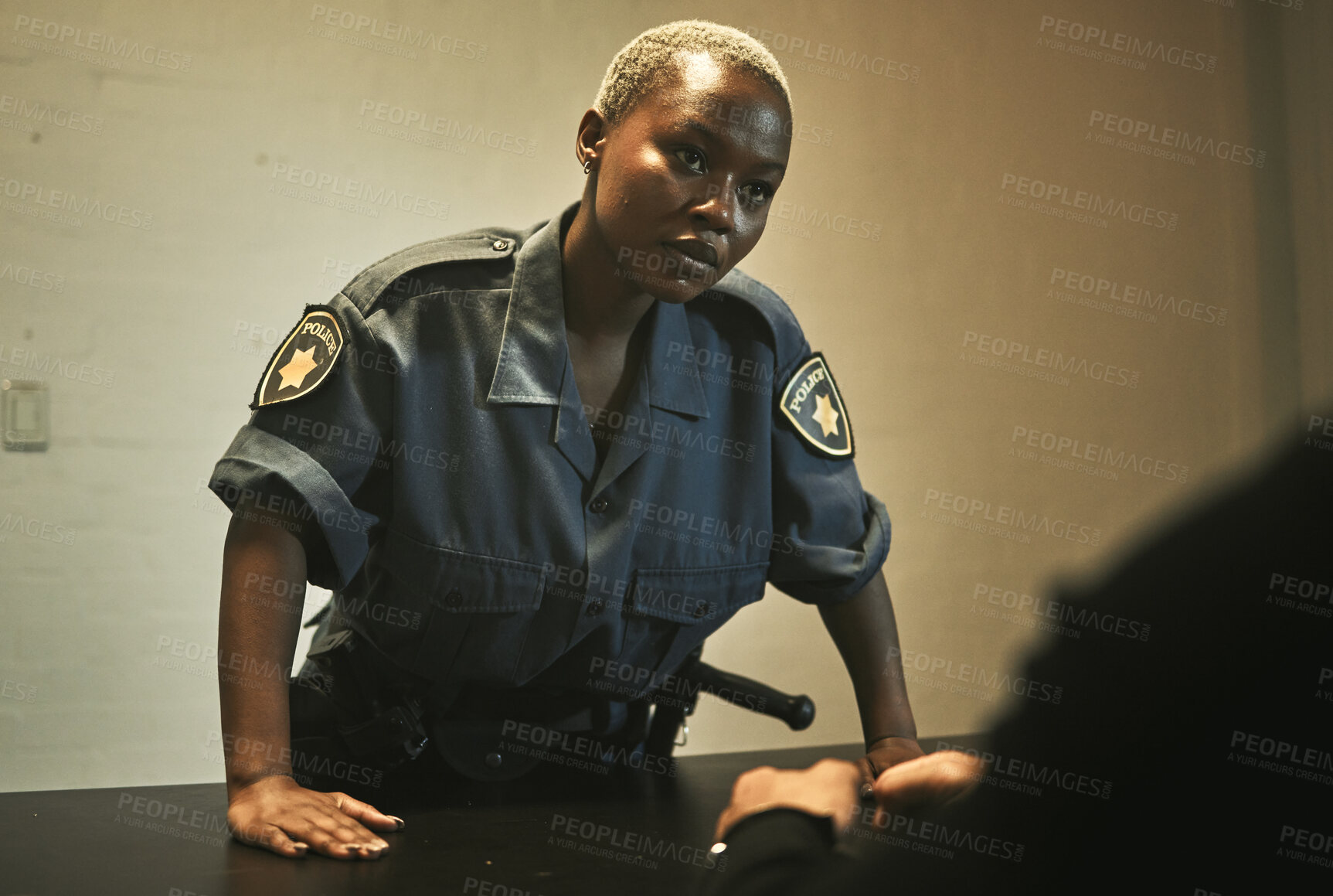 Buy stock photo Investigation, jail and police talking to criminal for interview, interrogation and arrested in station. Security, law and female officer with man, burglar or thief for crime, stealing and theft