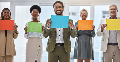 Buy stock photo Creative people, portrait and color poster for advertising, marketing or branding in teamwork at the office. Group of happy employees with colorful paper, sign or card for startup at the workplace
