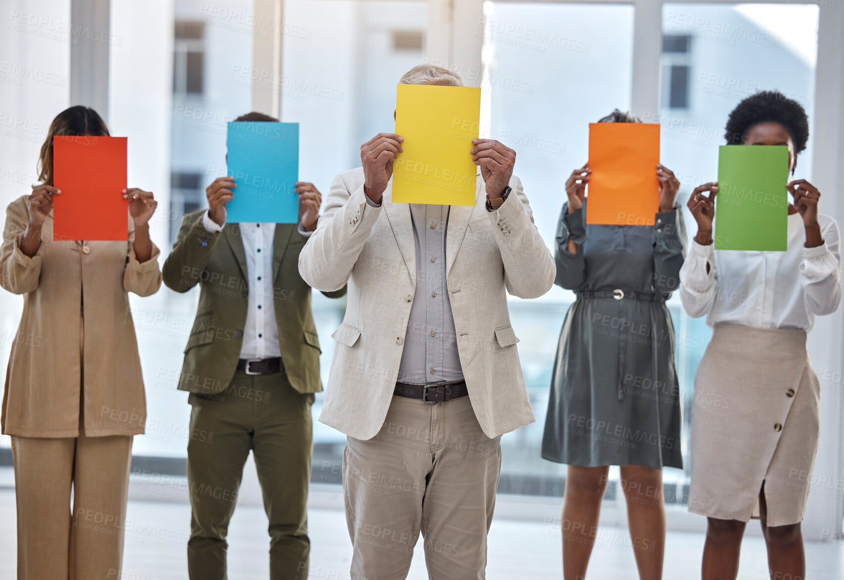 Buy stock photo Collaboration, paper and an anonymous business team standing in the office together to show selection options. Teamwork, mockup and color poster with a group of colleagues or employees at work