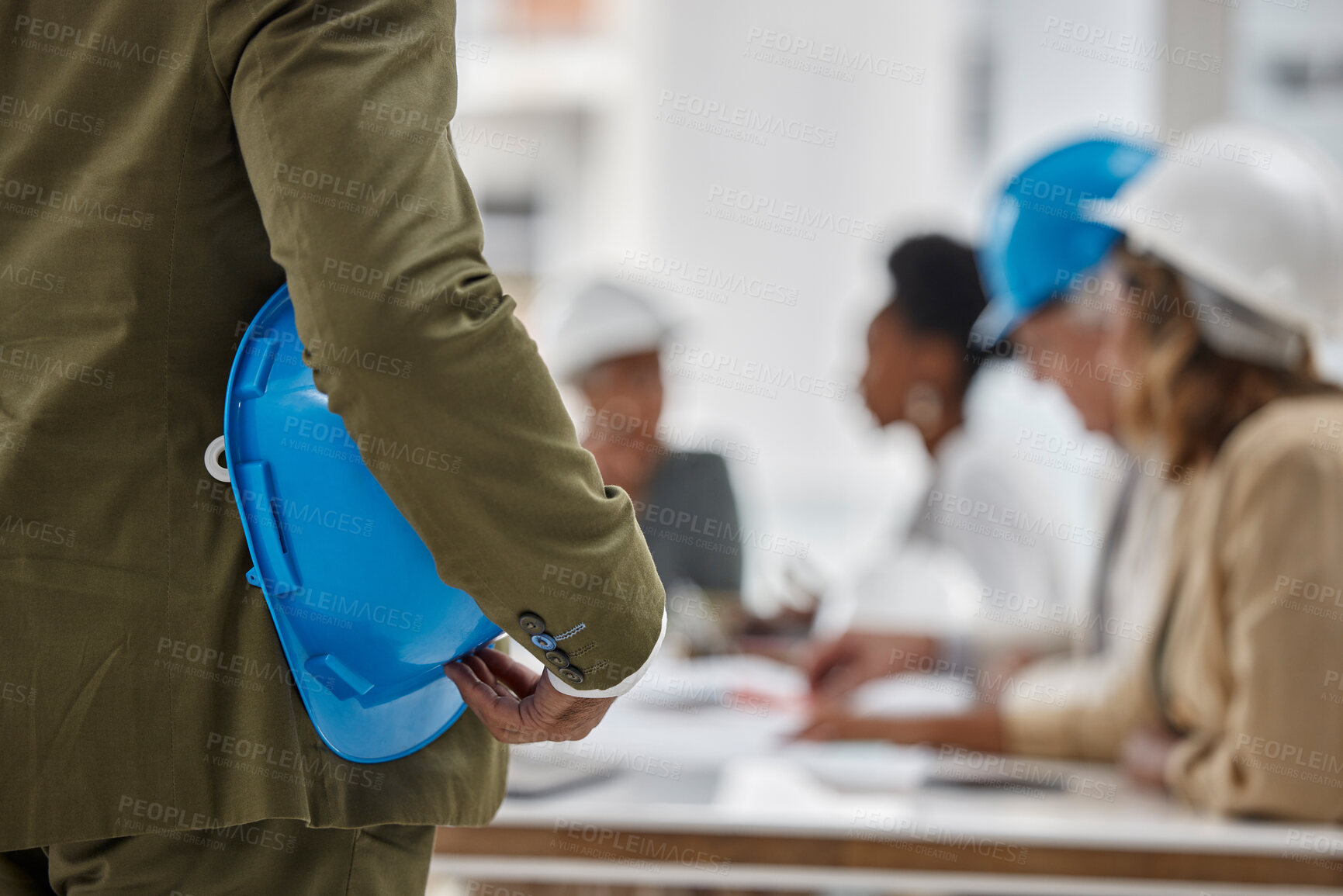 Buy stock photo Man, architect and hands in meeting for construction, teamwork or project plan with safety helmet at office. Hand of contractor with hard hat or team for industrial architecture, strategy or planning