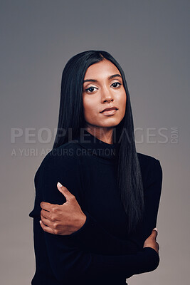 Buy stock photo Indian, woman with beauty and portrait with arms crossed, confidence and mindset with focus, vision or motivation in studio. Serious, calm face and model thinking of idea for fashion on background