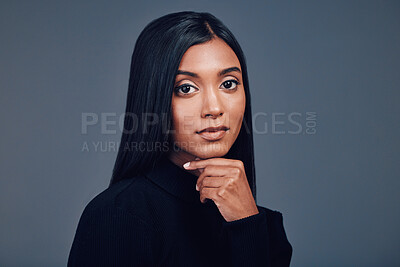 Buy stock photo Serious face, beauty and skincare of woman in studio isolated on a gray background mockup space. Portrait, natural and Indian model with spa facial treatment for aesthetic, healthy skin and cosmetics