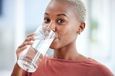 Buy stock photo Health, glass and portrait of a woman drinking water for hydration, wellness and liquid diet. Healthy, h2o and headshot of young African female person enjoying a cold beverage or drink at her home.