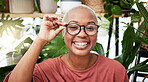Black woman, glasses and vision with smile in portrait, eye care and optometry with frame and prescription lens. Eyesight, health and ophthalmology, female person with spectacles or cosmetic eyewear