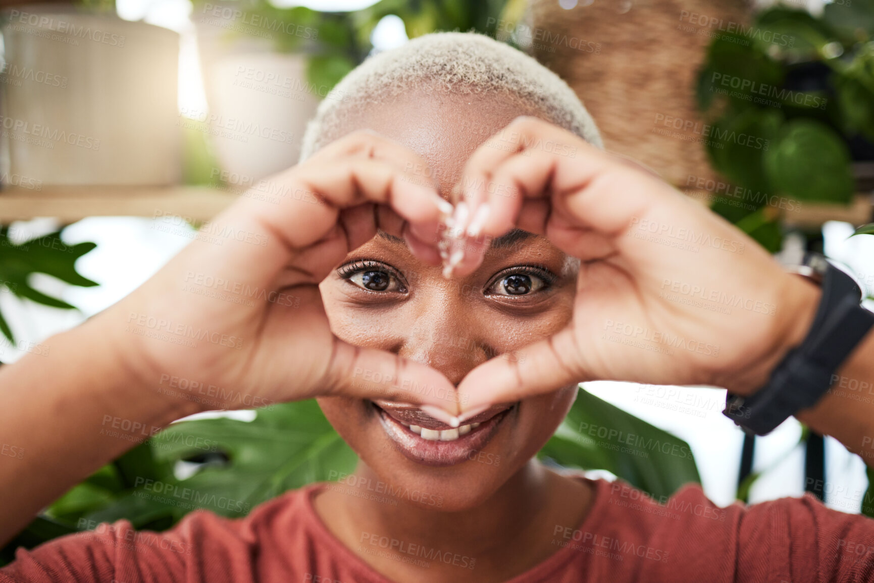 Buy stock photo Black woman, portrait and face with heart hands for love, sign or shape in natural wellness or eco friendly store. Happy African female person with loving emoji, symbol or gesture for care in garden