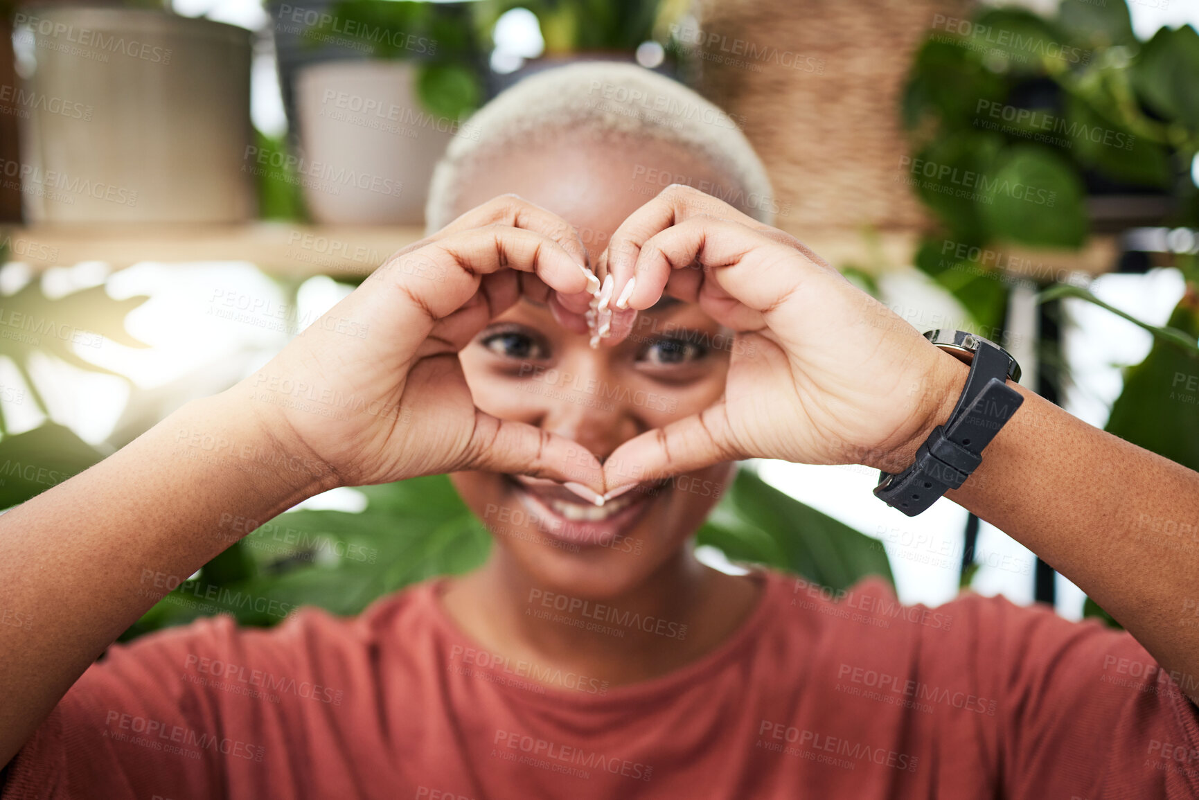 Buy stock photo Black woman, portrait and heart hands for love, sign or shape for health and wellness in eco friendly store. Face of happy African female person with loving emoji, symbol or gesture for natural care