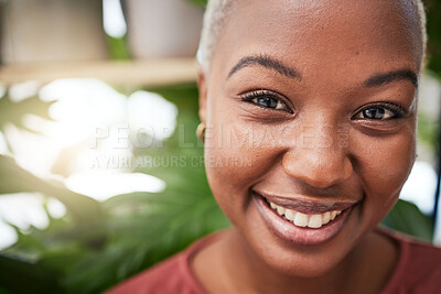 Buy stock photo Portrait, plants and smile with a black woman gardener in her home for sustainability or green growth. Face, beauty and flare with a happy young female person in a nursery for eco friendly gardening