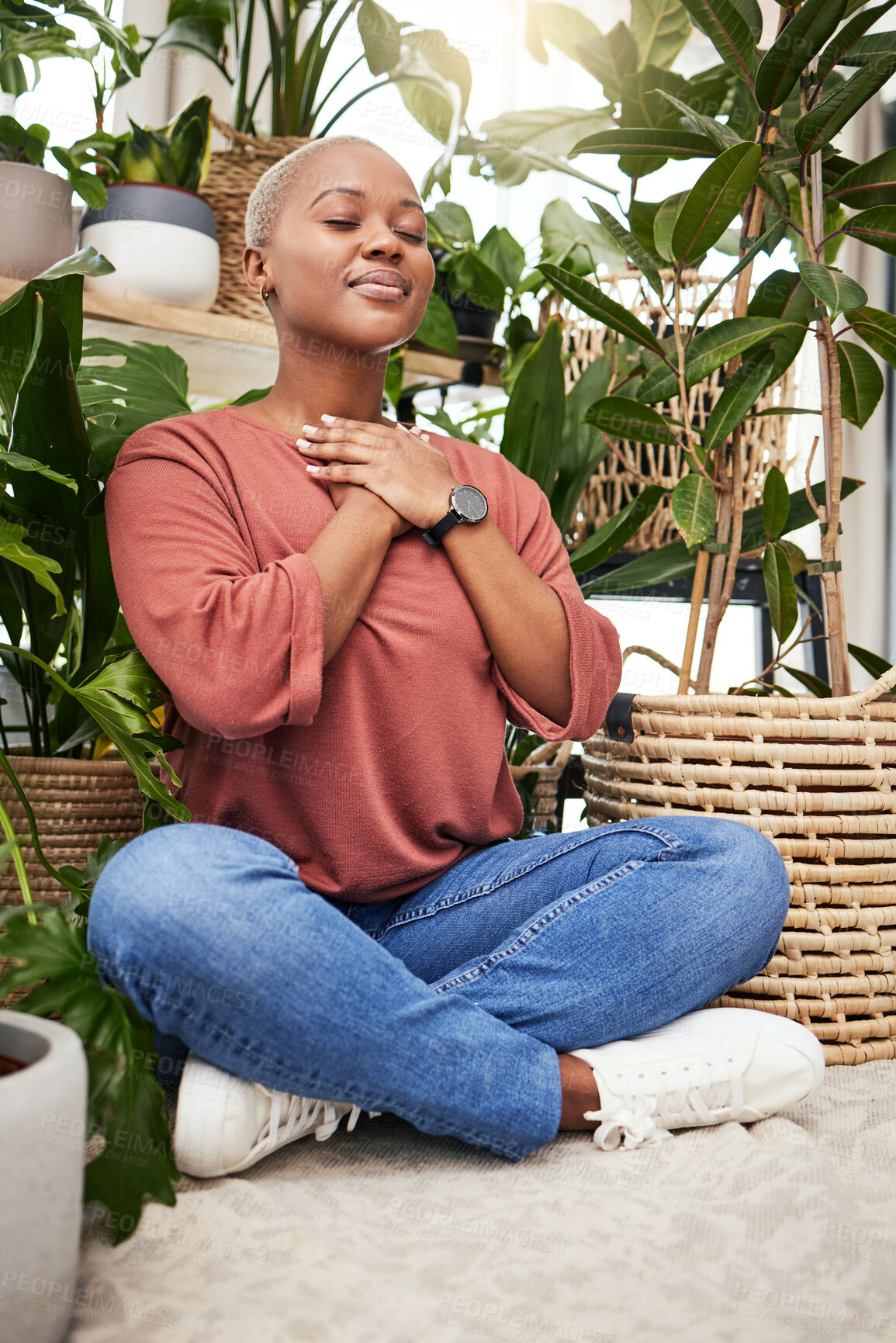 Buy stock photo Calm, peace and young woman by plants for breathing exercise in meditation in a greenery nursery. Breathe, gratitude and African female person with a relaxing zen mindset by indoor greenhouse garden.