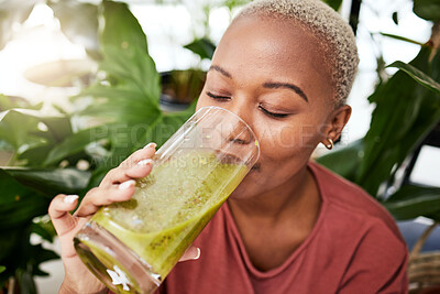Buy stock photo Black woman, diet and smoothie drink for vitamins, fiber or health and wellness in eco friendly store. Face of African female person drinking healthy beverage or organic fruit juice to lose weight