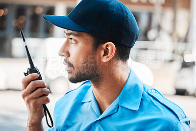 Buy stock photo Security guard, safety officer or man on walkie talkie on a street for protection, patrol or watch. Law enforcement, serious and communication with crime prevention male worker in uniform in the city