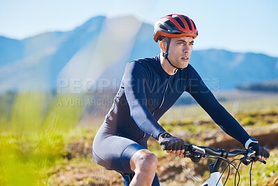 Buy stock photo Fitness, countryside or man cycling on a mountain bike for training, cardio workout or exercise outdoors. Serious, healthy biker or sports athlete riding a bike on a path for wellness or challenge