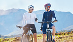 Fitness, bike and friends in nature for cycling, taking a break from their cardio or endurance workout. Exercise, mountain and a man cyclist team outdoor for sports training in a scenic environment