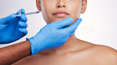Buy stock photo Hands, injection and face with filler, studio and cosmetic surgery for beauty, change and lips by white background. Surgeon, syringe and facial transformation for patient, service and skin aesthetic