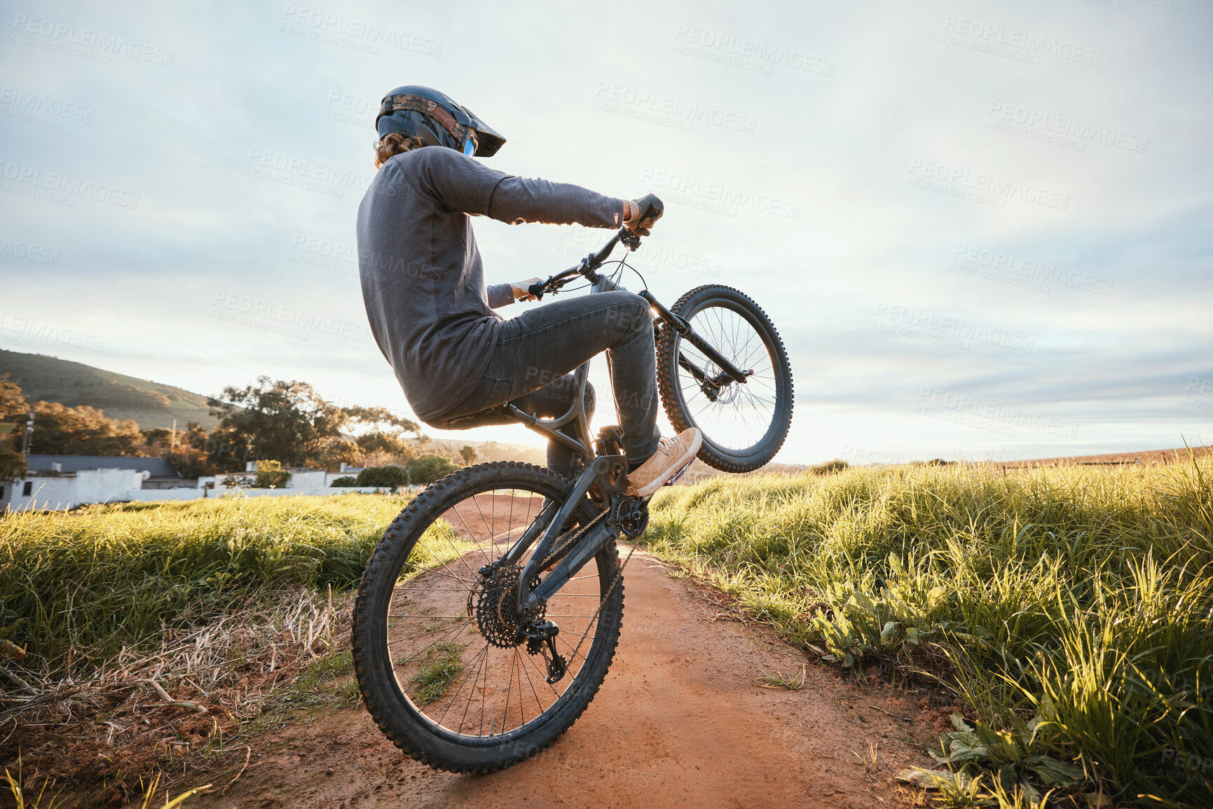 Buy stock photo Sports, cycling and man on bicycle in countryside for training, workout and exercise in nature. Fitness, cyclist and person on mountain bike for adventure, freedom and adrenaline on outdoor dirt road