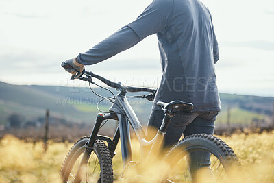 Buy stock photo Extreme sports, cycling and man with bicycle in nature for training, workout and exercise in countryside. Fitness, cyclist and person with mountain bike for adventure, freedom and ride on dirt road