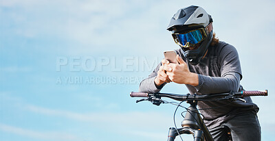 Buy stock photo Phone, mockup and cyclist on a bicycle typing social media, online or internet for bike extreme sports communication. Outdoor, fitness and biker or person texting or search the web or website