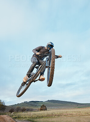 Buy stock photo Cycling, fitness and man with bicycle jump for extreme sports, energy and adrenaline in nature. Action, bike and cyclist in countryside with speed, trick and skill, adventure or power on mockup space