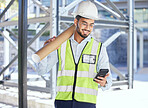 Architecture, phone typing and happy man with blueprint at construction site, networking and communication with text. Engineering, cellphone and checking email with safety and planning with smile.