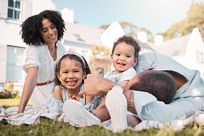 Buy stock photo Love, blended family and parents on the lawn with their children in the garden of their home together. Mother, father and portrait of kids sitting on the grass in the yard of their house for bonding