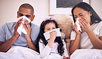 Family, sick and blowing nose on a bed together in a bedroom with allergy or virus and wipe with tissue. Disease, mother and father with kid or child with cold, flu and in winter as parents and girl