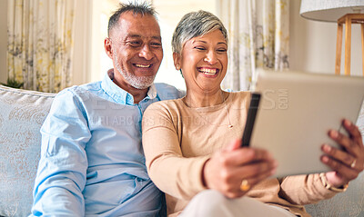 Buy stock photo Senior couple, tablet and video call at home for communication, network connection or chat. Mature man and woman together with technology, social app and internet on a living room couch with a smile
