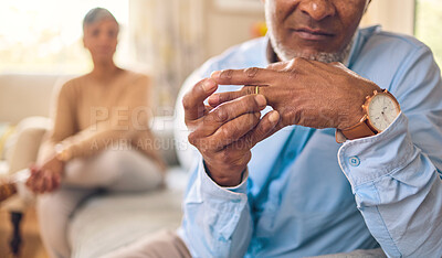 Buy stock photo Elderly couple, hands and ring in divorce, fight or conflict from disagreement or argument on sofa at home. Senior man and woman in depression, infertility or cheating and toxic marriage in the house