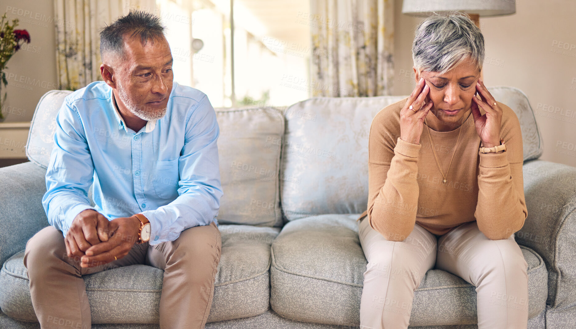 Buy stock photo Senior couple, divorce and fight in conflict, argument or disagreement on living room sofa at home. Elderly man and frustrated woman in depression, infertility or toxic relationship in the house