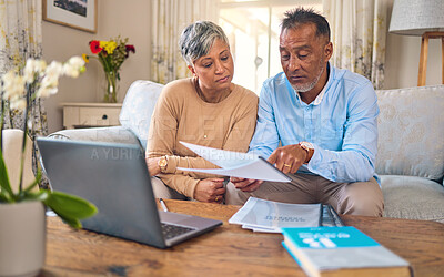 Buy stock photo Laptop, documents and payment with a senior couple in the home living room for retirement or budget planning. Computer, financial or investment savings with a mature man and woman in a house