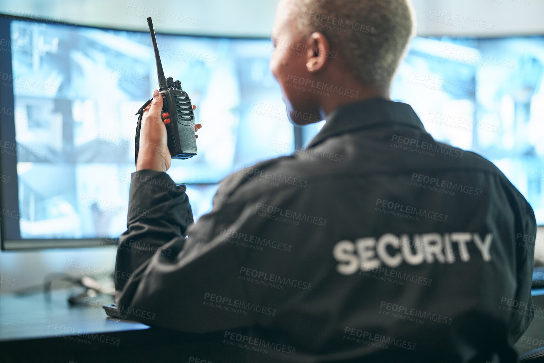 Buy stock photo Back, security and radio surveillance with a woman officer in a control to monitor criminal activity. Safety, dispatch and cctv with a female guard sitting in her office using a walkie talkie