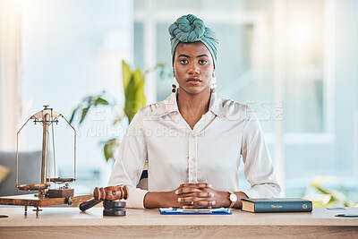 Buy stock photo Lawyer, portrait and serious black woman on table in office, law firm or workplace. African attorney, face and confident professional, employee or worker on desk for legal advisor career in Nigeria.