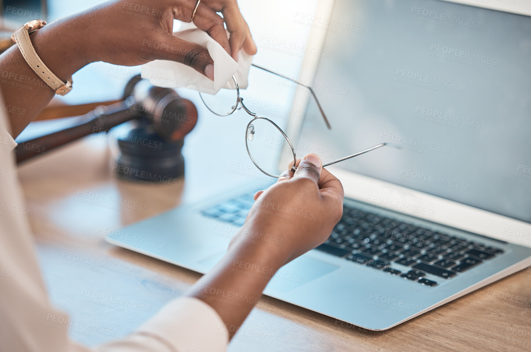 Buy stock photo Hands, glasses and cloth for cleaning in office for dust, dirt removal and clear vision with laptop mockup space in law firm. Eyewear, lens and person with fabric to wipe spectacles for maintenance.